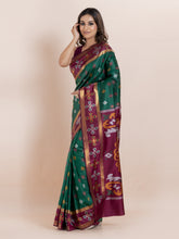 KAVVYA  BOTTLE GREEN COLOUR & IKAT WEAVING SAREE